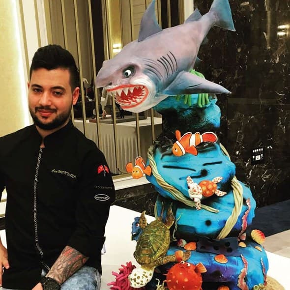 A sculpted shark celebration cake by Can Montana
